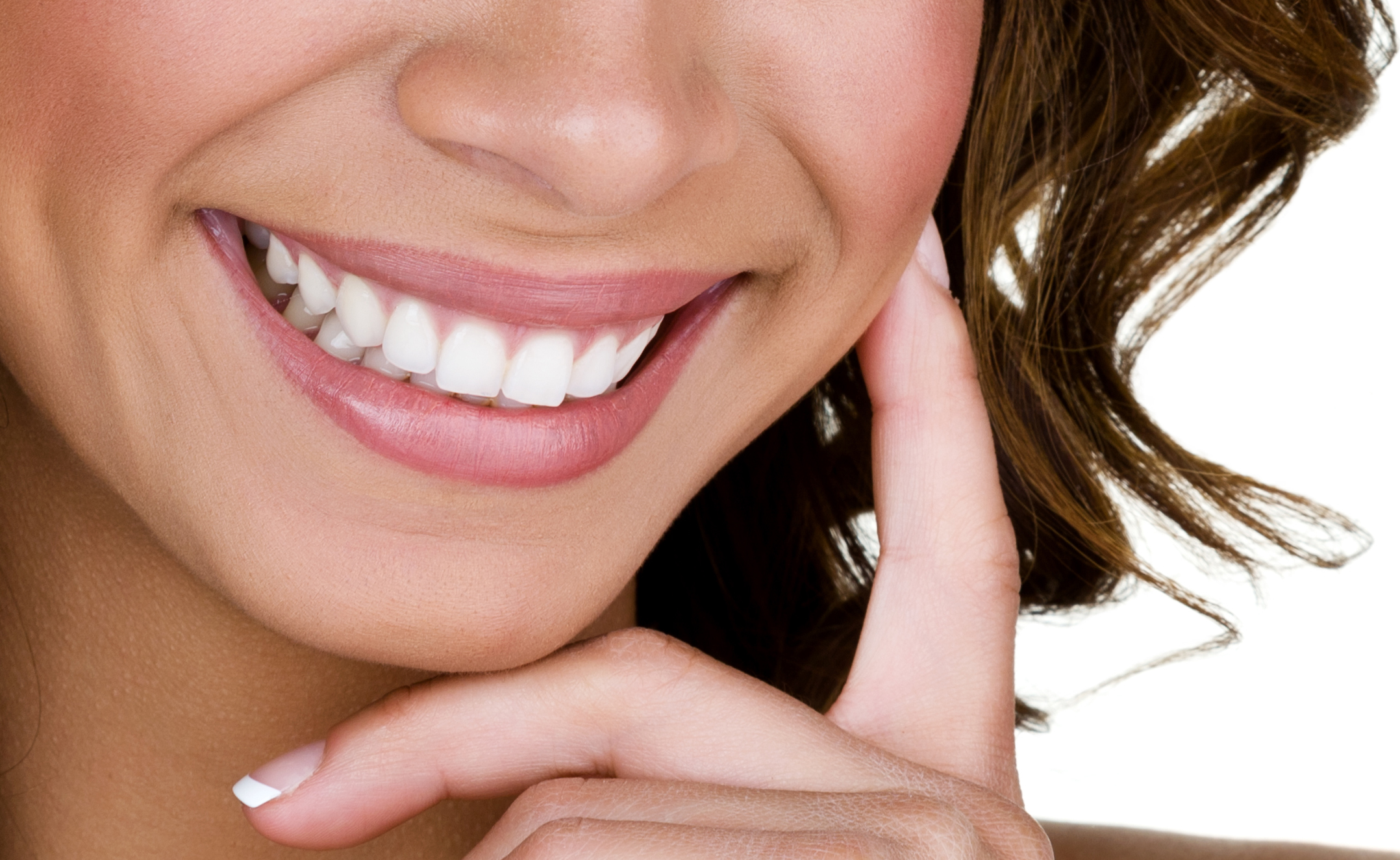 There are essentially 2 ways of making the teeth whiter without covering th...